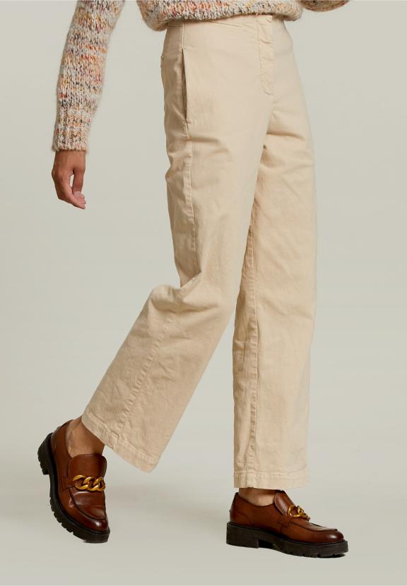 Pantalon taille haute beige avec poches passepoilées